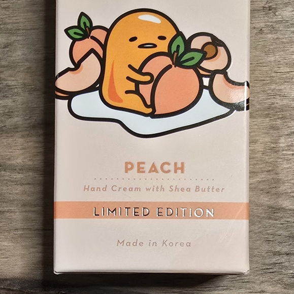 Gudetama X The Creme Shop Hand Cream Peach 1.69oz - Picture 3 of 6